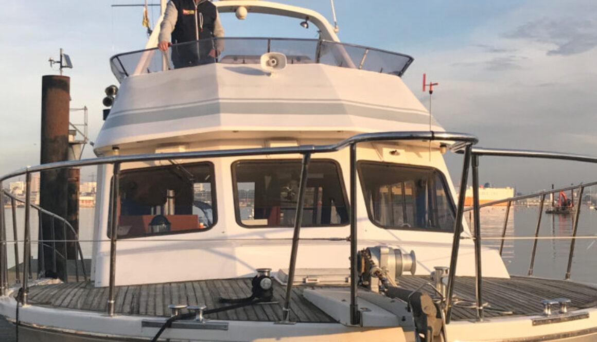 Chris on the deck of his boat ‘Crackerjack’
