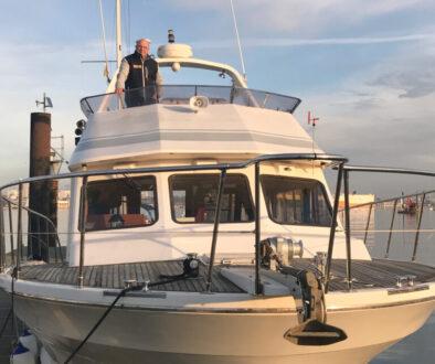 Chris on the deck of his boat ‘Crackerjack’