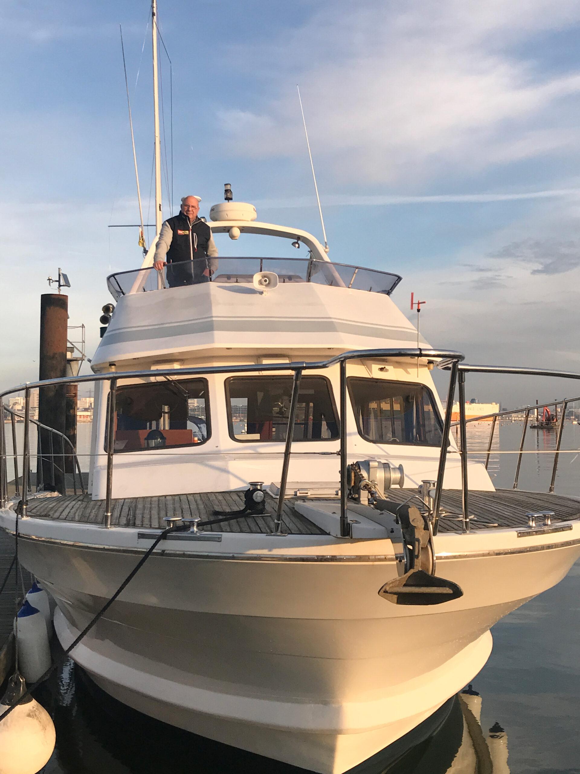 Chris on the deck of his boat ‘Crackerjack’